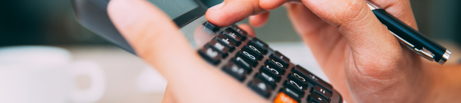 person using calculator